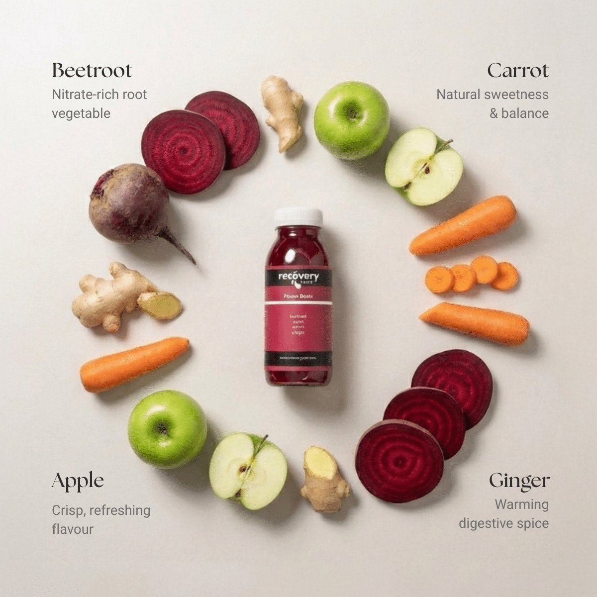 Cold-pressed beetroot and ginger juice with fresh beetroot, apple, carrot and ginger ingredients