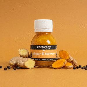 Cold-pressed ginger turmeric shot with fresh ginger, turmeric root and black pepper for absorption.