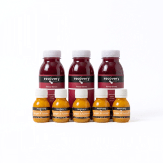 Power Duo bundle with Power Beets cold-pressed juice and Ginger Turmeric shots on white background