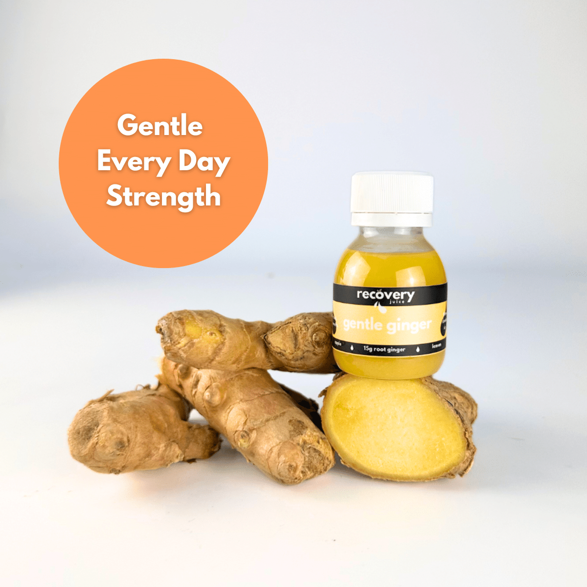 Gentle Ginger shot bottle with fresh ginger root and “Gentle Every Day Strength” badge