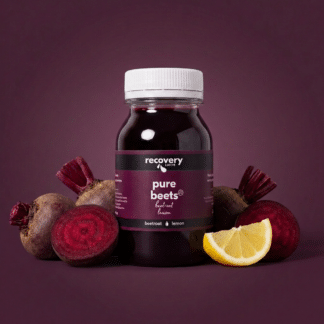 Nitrate-rich cold pressed beetroot juice bottle with fresh beetroot