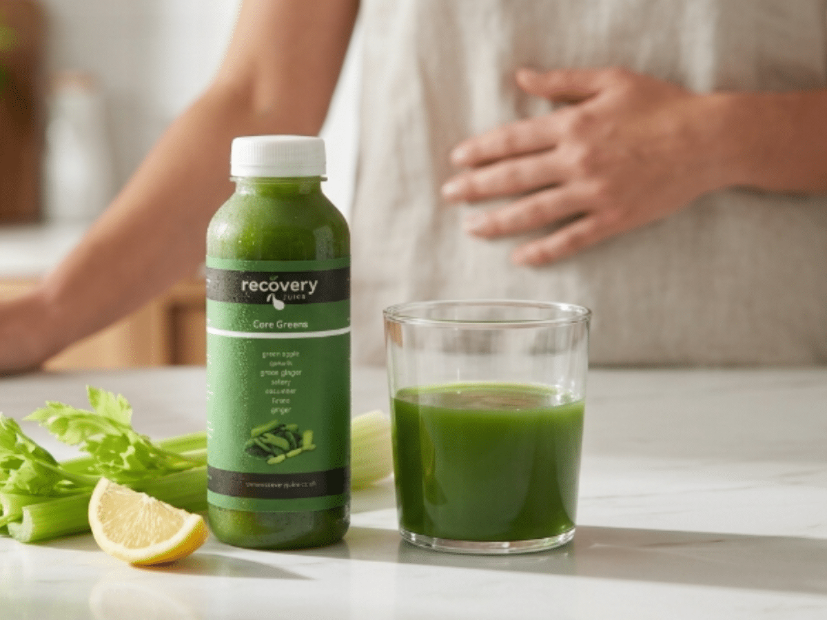 Cold-pressed green juice for gut health with celery, lemon and ginger to support digestion and reduce bloating