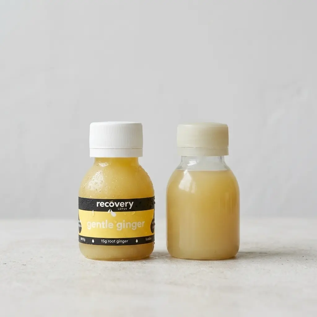 A cold-pressed frozen-fresh ginger shot beside a plain shelf-stable shop-bought shot